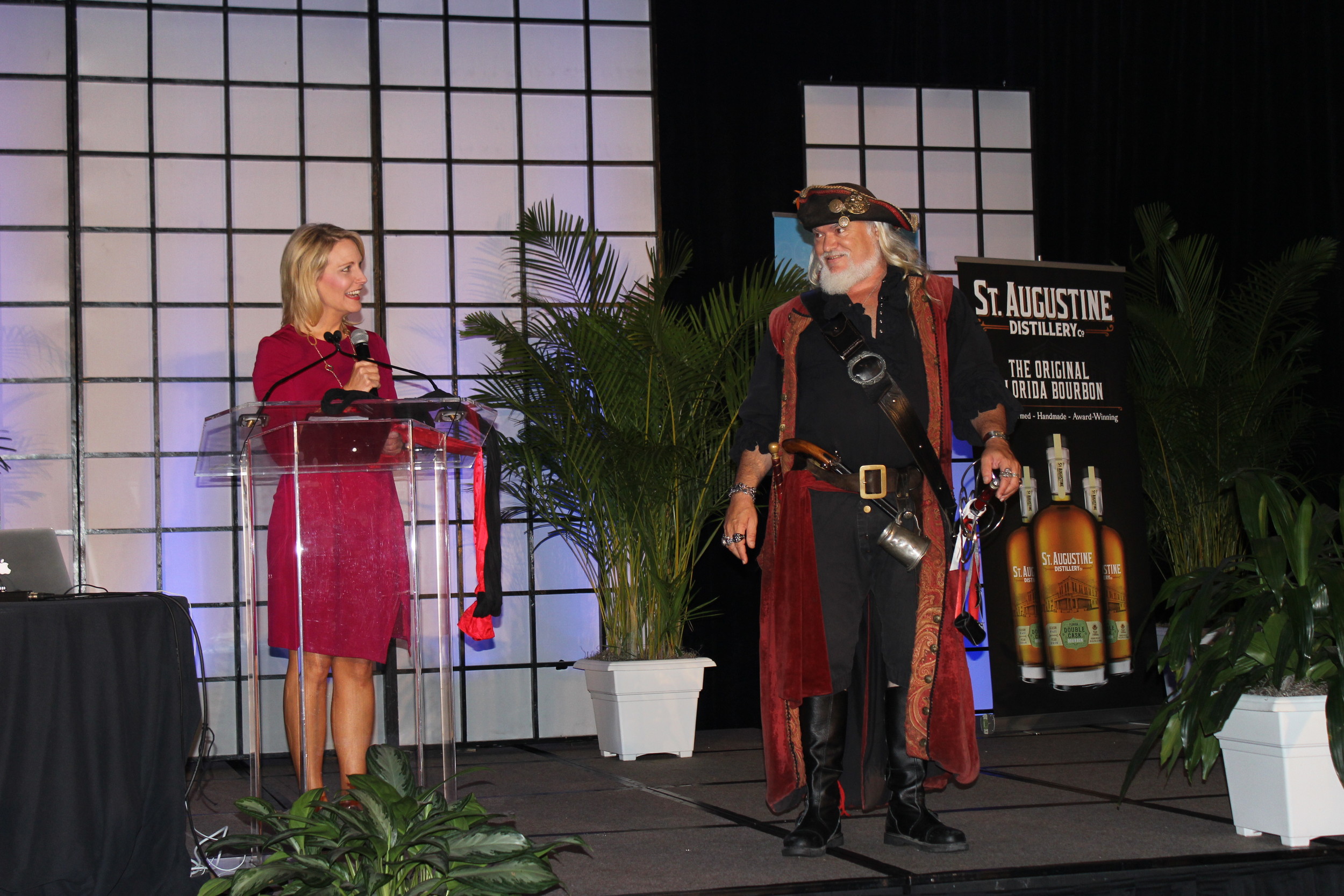 First Coast News Anchor Jessica Clark welcomes a pirate at the tourism event.