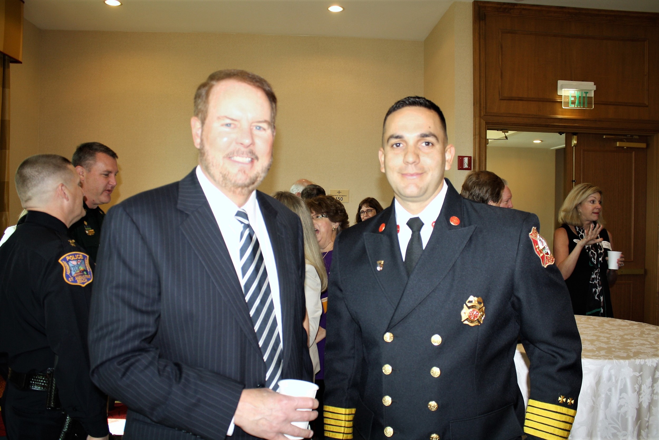 County Administrator Michael Wanchick and St. Augustine Fire Chief Carlos Aviles