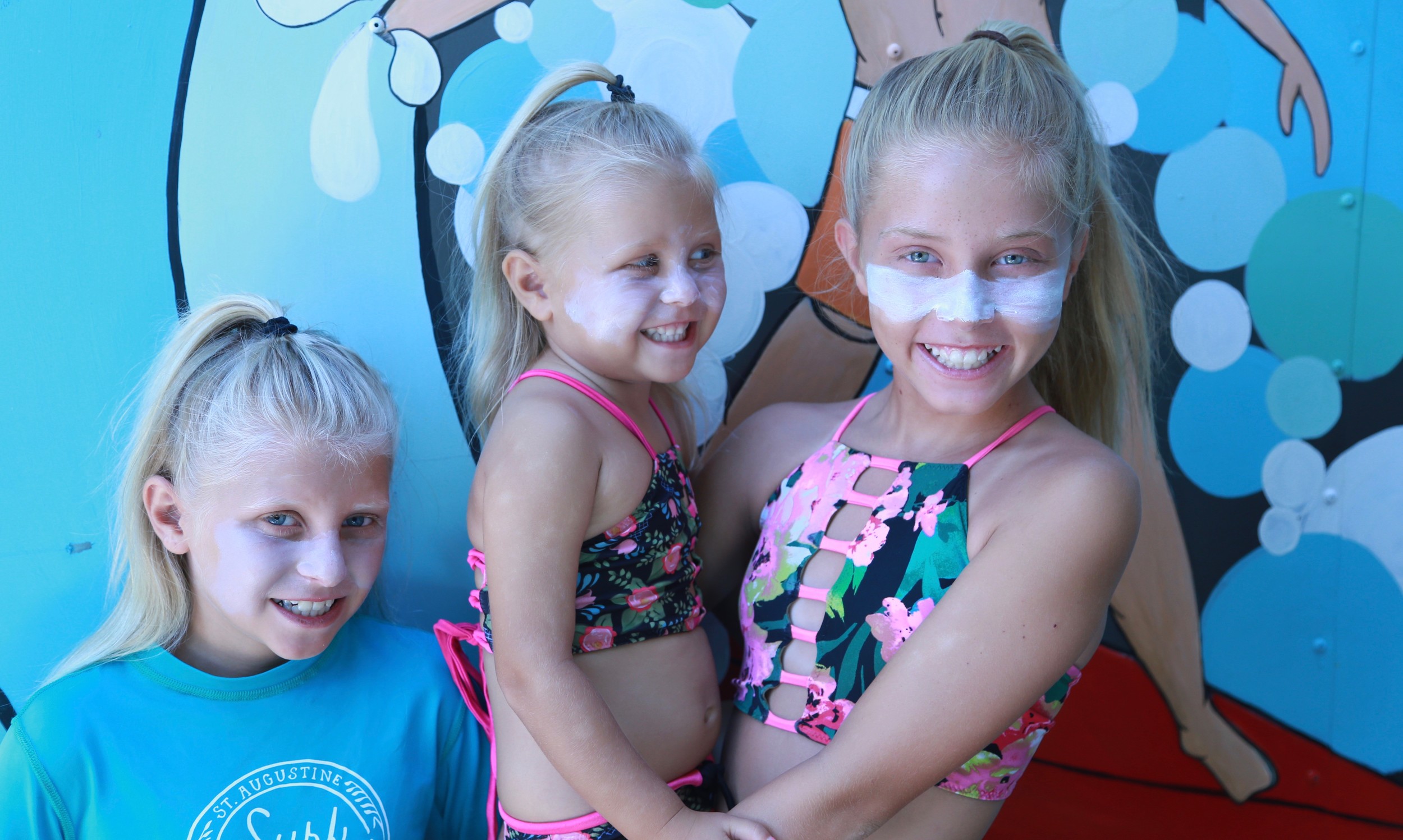 Lauren and Dustin Estes’ daughters Sunny, Sage and Shaylee wear Tribe Apothecary’s zinc-based sun block.