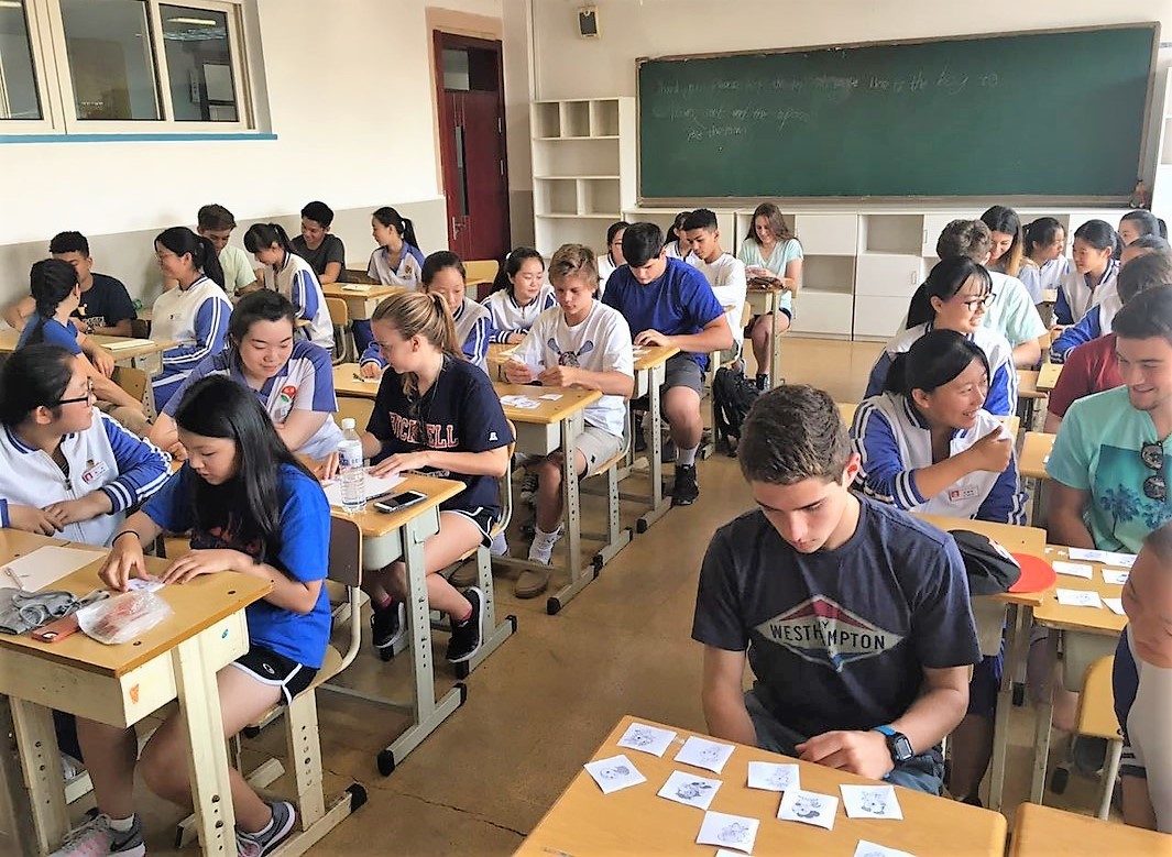 Qingdao students teach Bolles students to play traditional Chinese games.