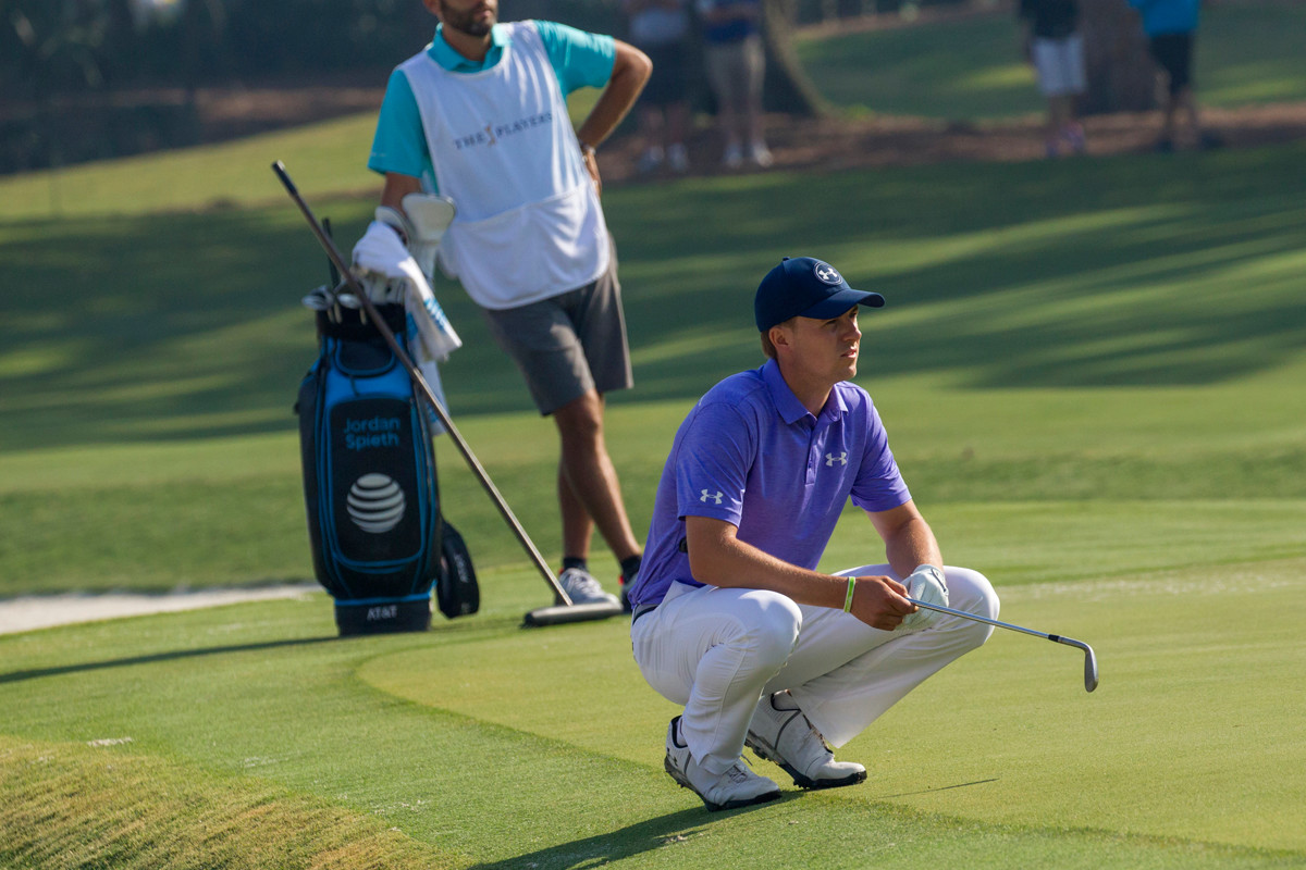 Jordan Spieth assesses his next stroke at THE PLAYERS in May.