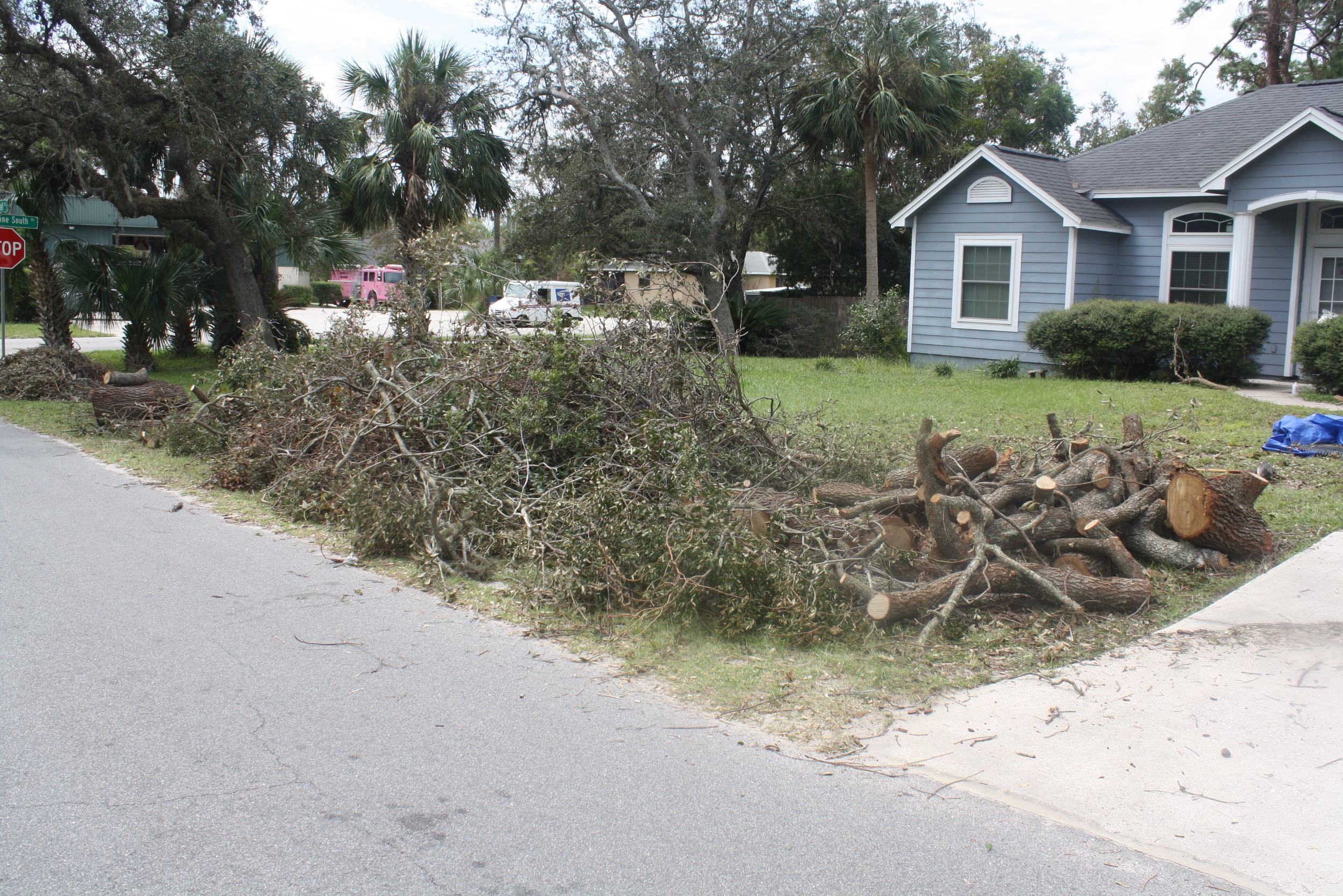 Storm debris from Hurricane Irma lines a resident’s yard in St. Augustine.