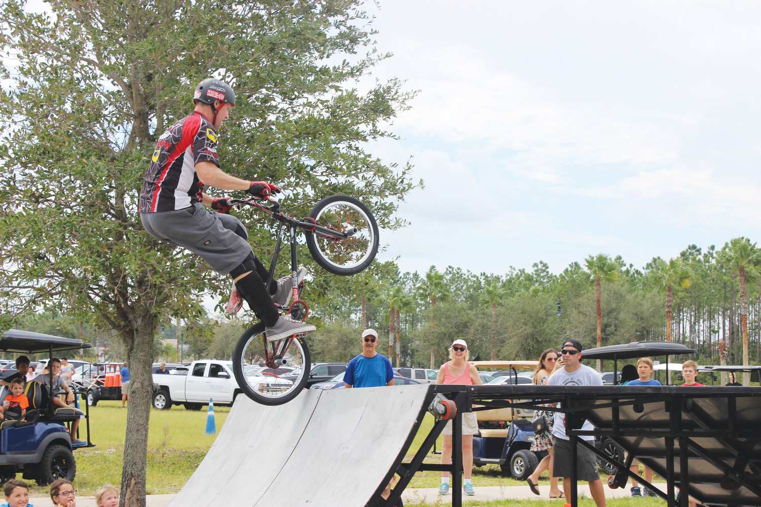 A member of Perfection on Wheel’s BMX Pros Trick Team performs a half-pipe trick in front of the crowd at the Nocatee Farmers Market Sept. 16. In addition to this action-packed show, visitors at the market enjoyed checking out over 70 vendors offering items such as organic produce, herbs, spices, unique foods, crafts, jewelry and more. The next Nocatee Farmers Market is Oct. 21, inviting the community to get into the fall spirit with Nocatee’s annual Fall Festival. The event takes place the third Saturday of each month on the Farmers Market Field at Nocatee Town Center.