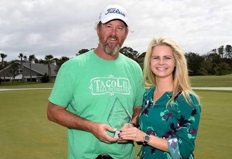 Don Nicol (left), received the Web.com Small Business of the Tournament Award, during the Web.com Tour Championship from Hannah Hawkins (right), Sports Marketing Manager at Web.com, in Jacksonville, Florida.