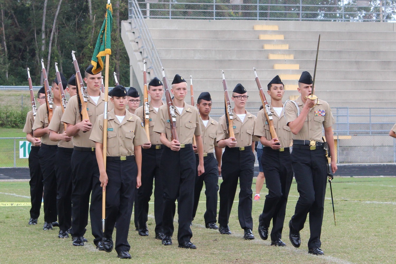 Cadet Peyton Gustafson leads the Nease NJROTC Armed Basic Drill Team to a first-place finish at the Ed White drill meet on Sept. 30.