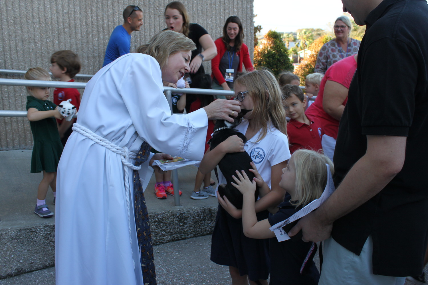 Attendees enjoy Beaches Episcopal’s “Blessing of the Pets.”