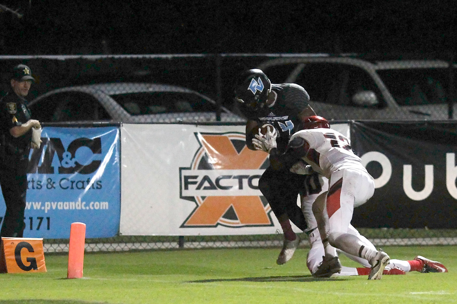Christian Herring bulls his way into the end zone for a Shark TD.