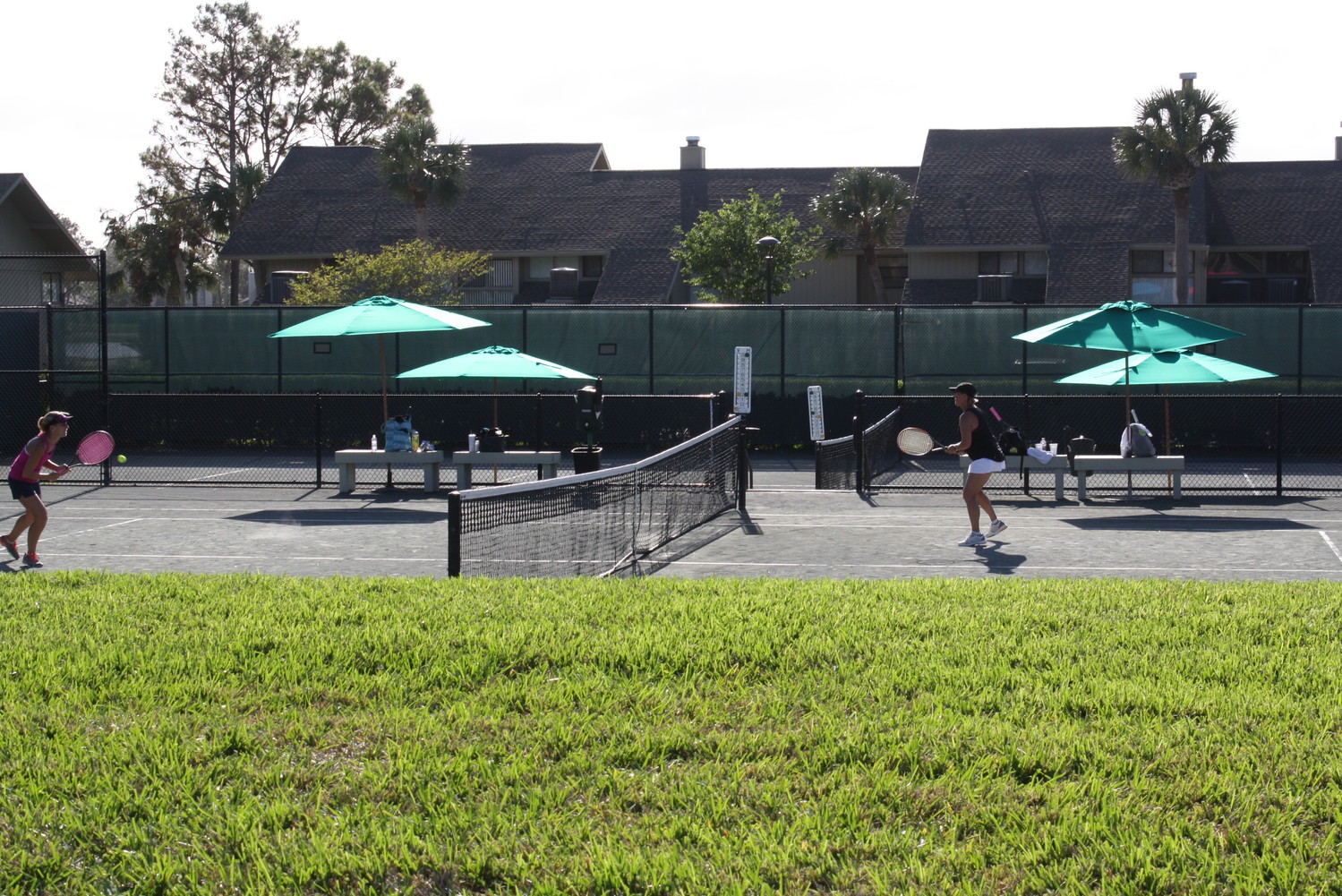 Women compete in a doubles match at the SenioRITAs tennis tournament Friday, Oct. 20.