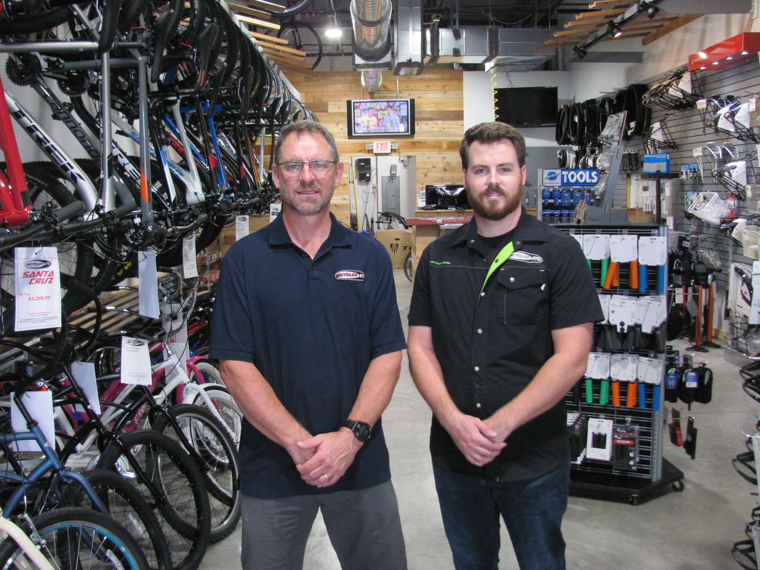 Owner Michael Scarbrough and sales associate Riley Peters pose for a photo in their newly opened Bicycles Etc. at Nocatee Town Center. The store “soft opened” about three weeks ago and held its grand opening event last weekend. The business is located on Capital Green Drive, just southeast of Publix, and offers bicycles (ranging from kids’ bikes to fast road racers), parts and accessories, as well as repair services and rentals. For more information on the business, visit http://bicyclesetc.net/.