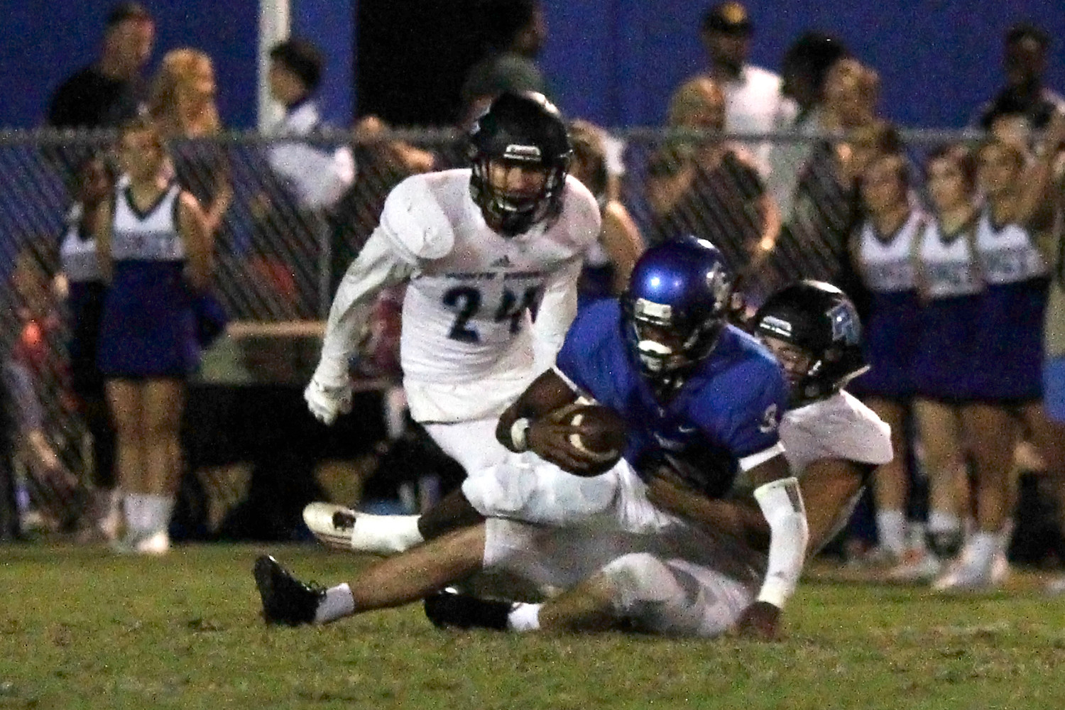 Gibson Pardue makes the tackle for the Sharks.