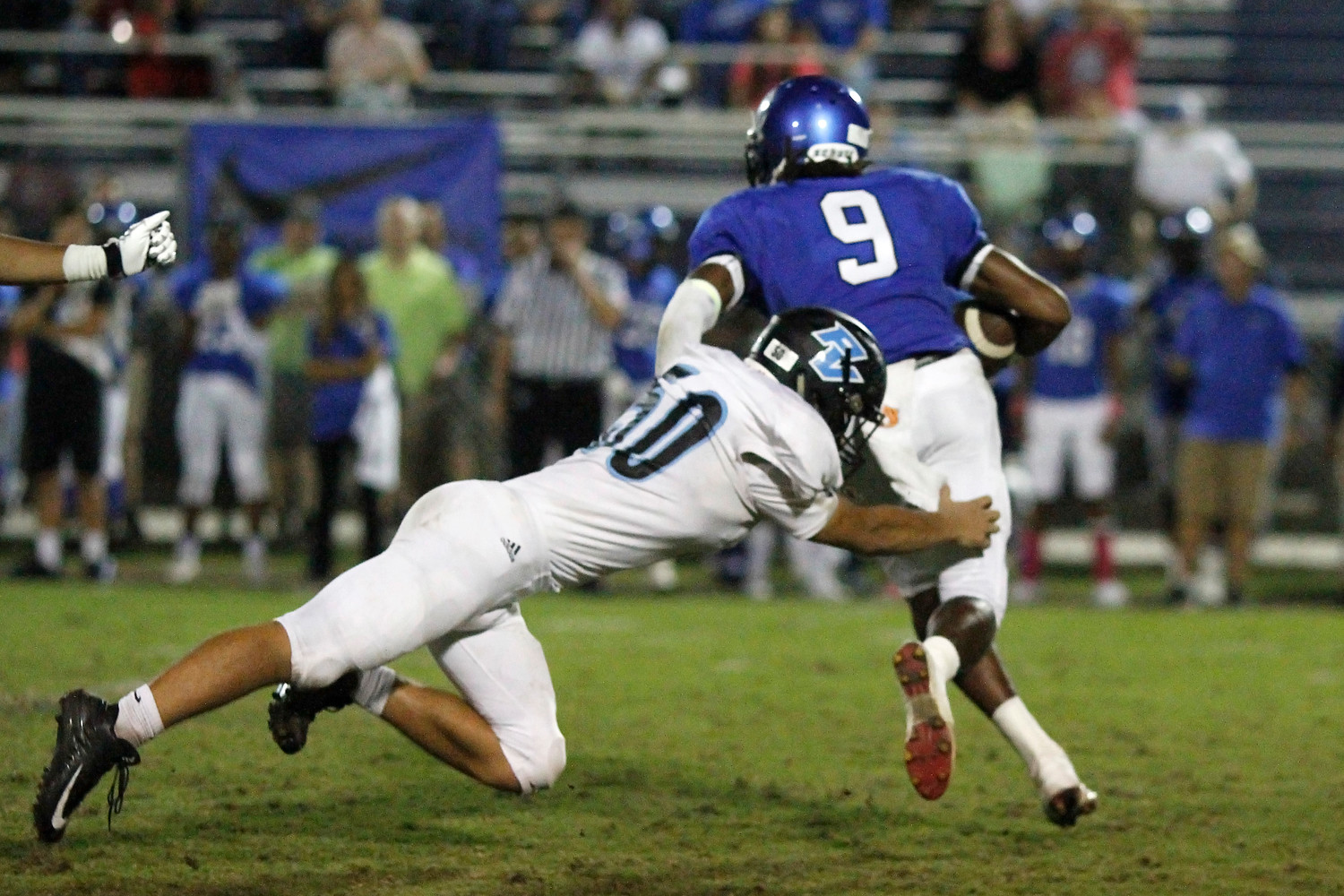 Daniel Lichlyter makes the tackle for the Sharks.
