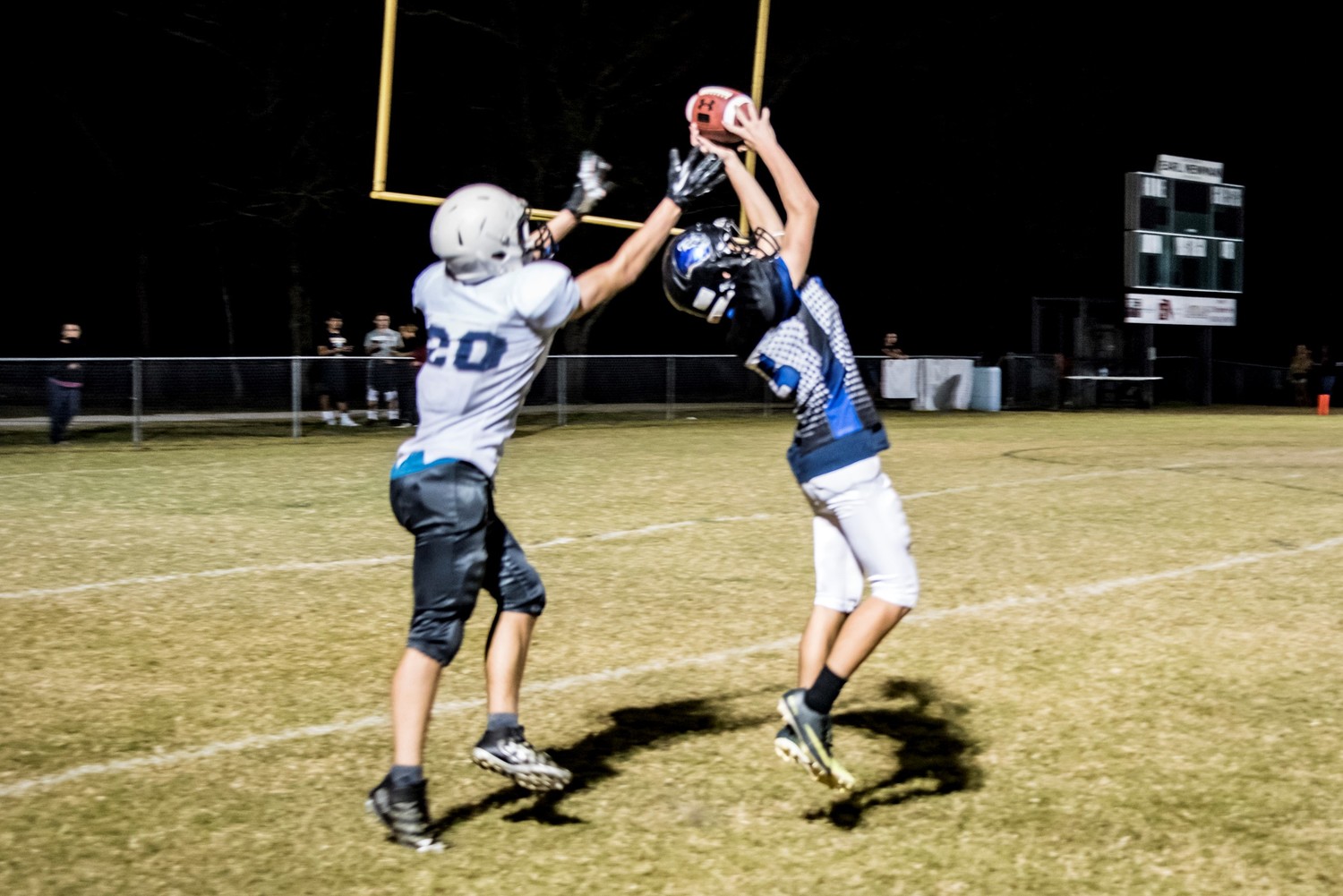 A Lions receiver goes vertical for the catch.