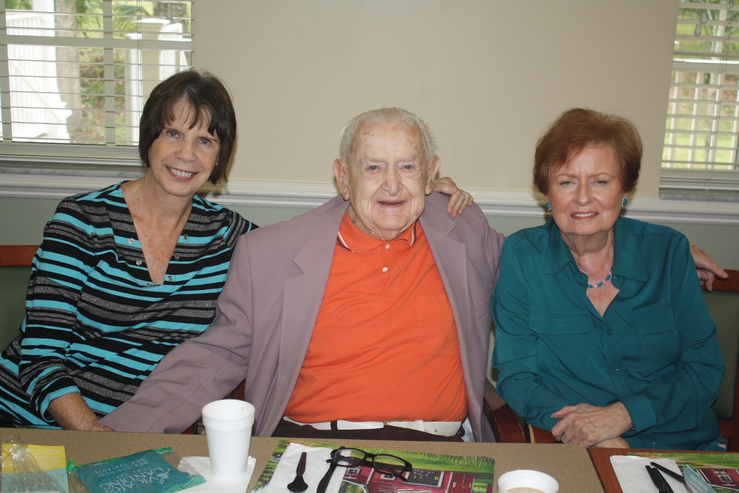 Joyce Scott, Nelson Johnson (97 years old, Army veteran in WWII) and Helen Martin