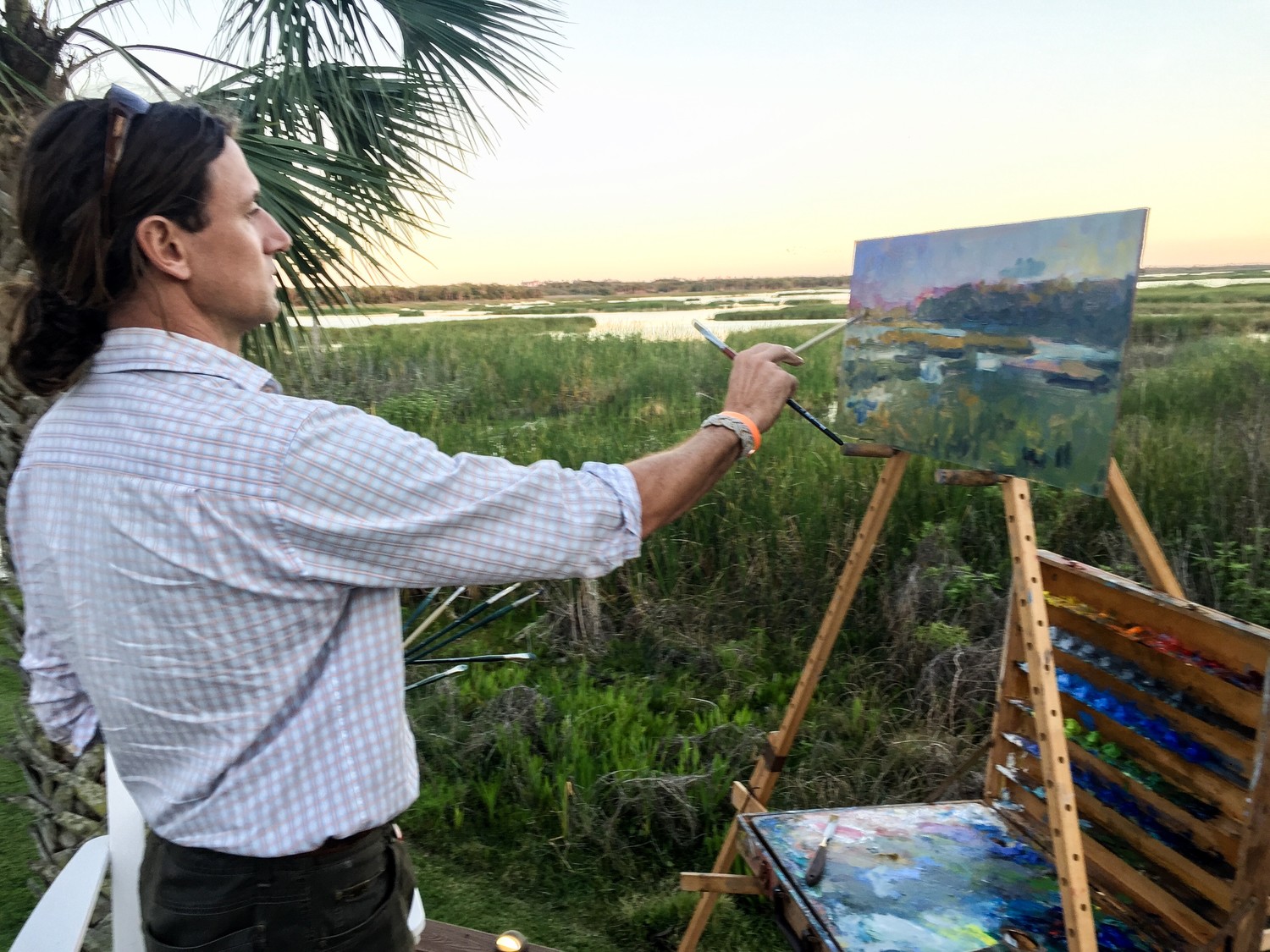 Eugene Quinn paints a scene at the Guana Preserve.