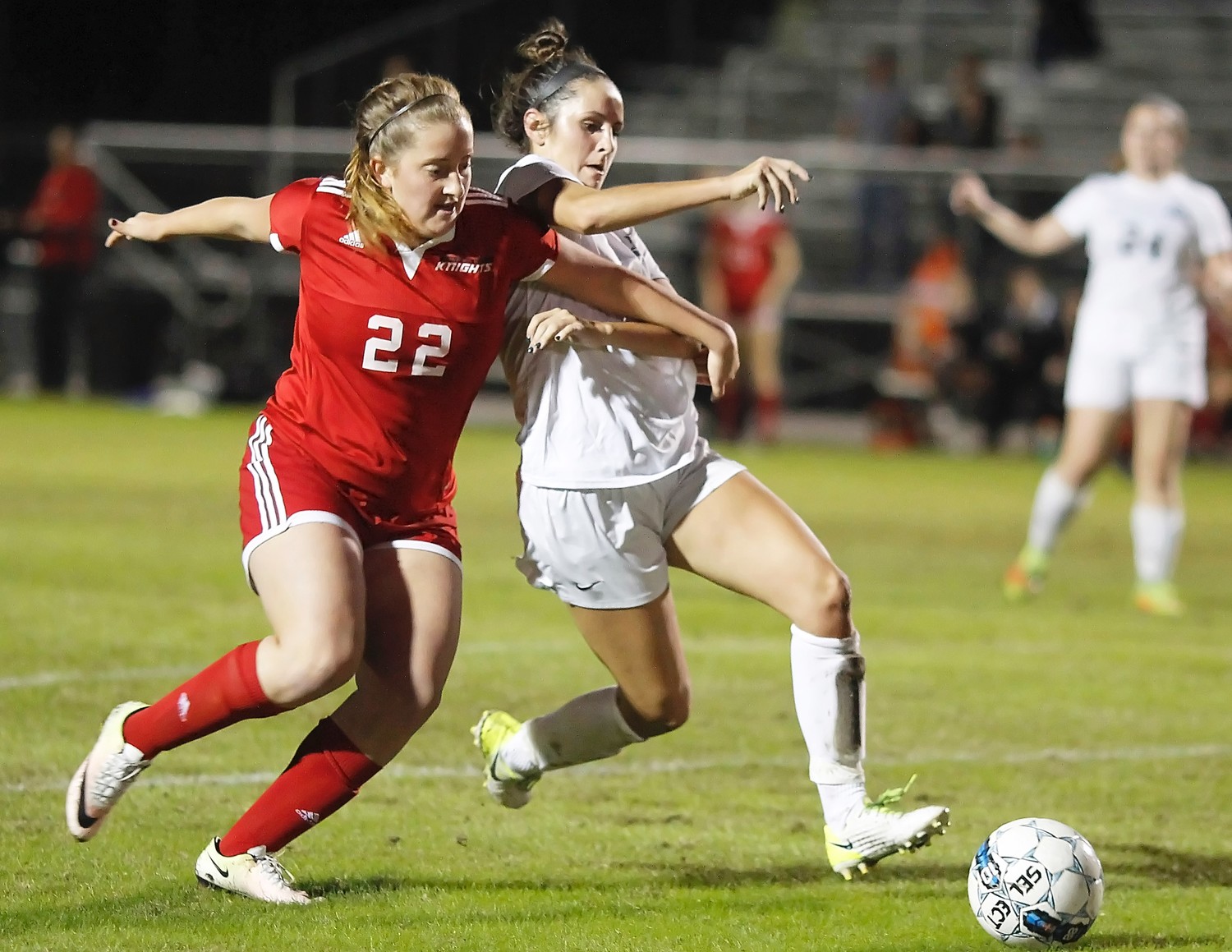 Piper Dotsikas fights to control the ball in front of the Creekside goal.