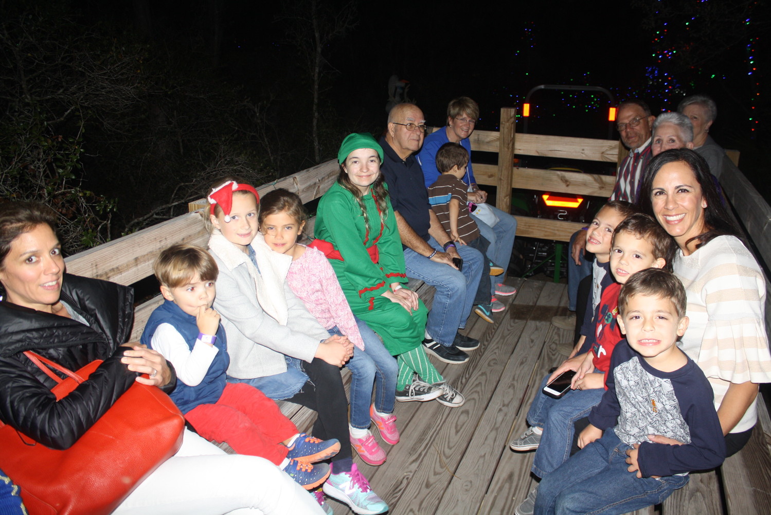 Visitors enjoy a tractor ride on the Enchanted Trail.