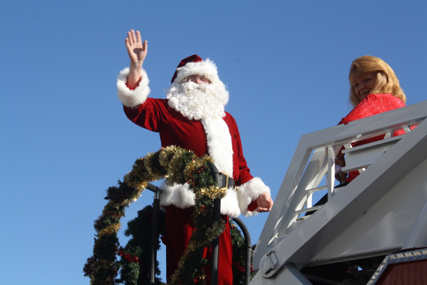Santa Claus greets parade attendees as the last attraction of the annual holiday event.