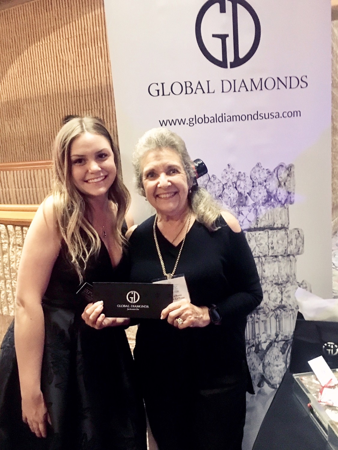 Kasey Bubbs (Global Diamonds) and Joanne Lapoma gather at the show.