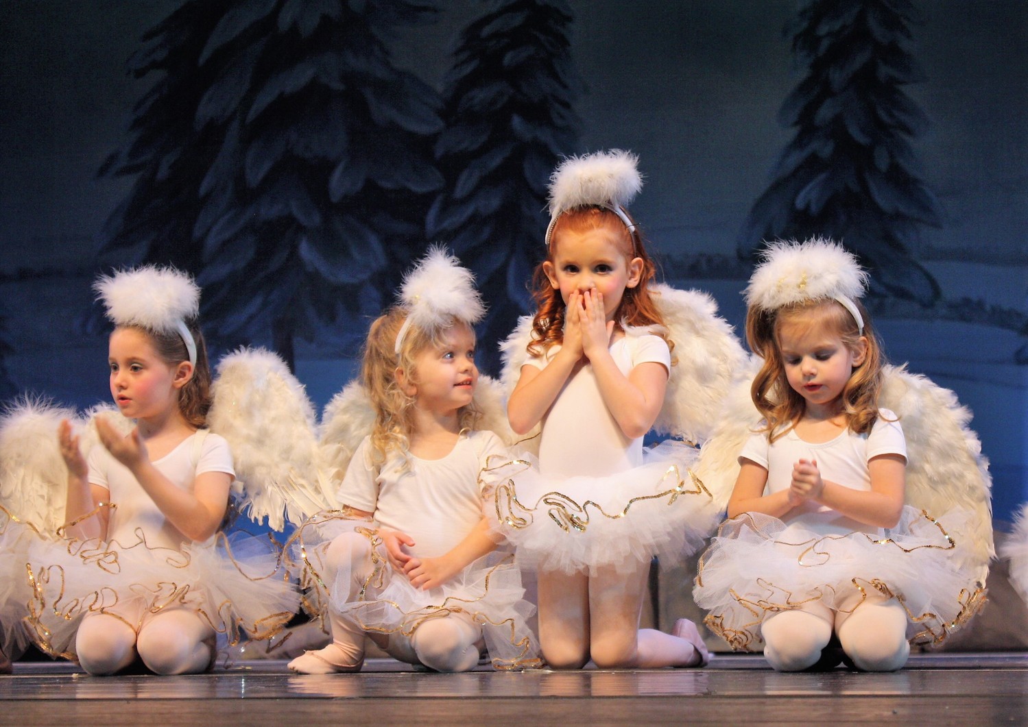 Angelic cherubs blow kisses to the audience at the Christ Episcopal Church performance of “The Nutcracker” Dec. 9.