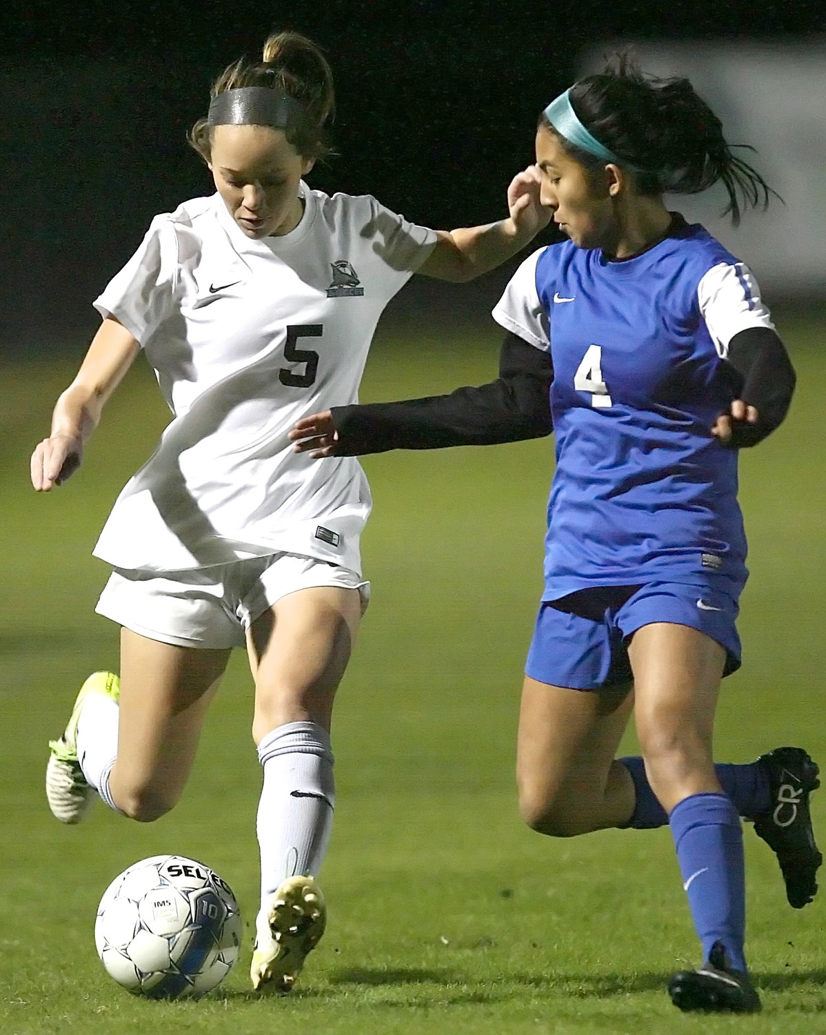 Tatum Taucher (5) of the Sharks crosses the ball to a teammate. Taucher scored one goal in the Clay win.