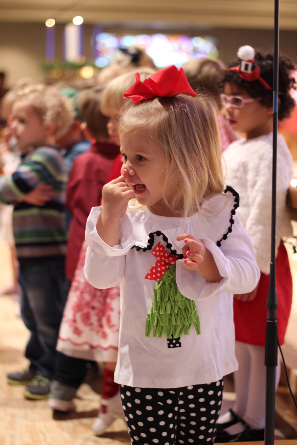 Hadley Grace Kelly enjoys Christ Episcopal Church Preschool’s annual Christmas program.