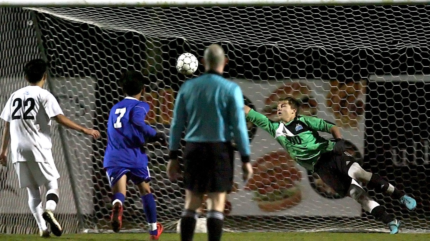 Shark goalkeeper Brian Salzman lays out as he attempts to make a save on a Menendez shot that went wide. Ponte Vedra defeated Pedro Menendez on Dec. 13.