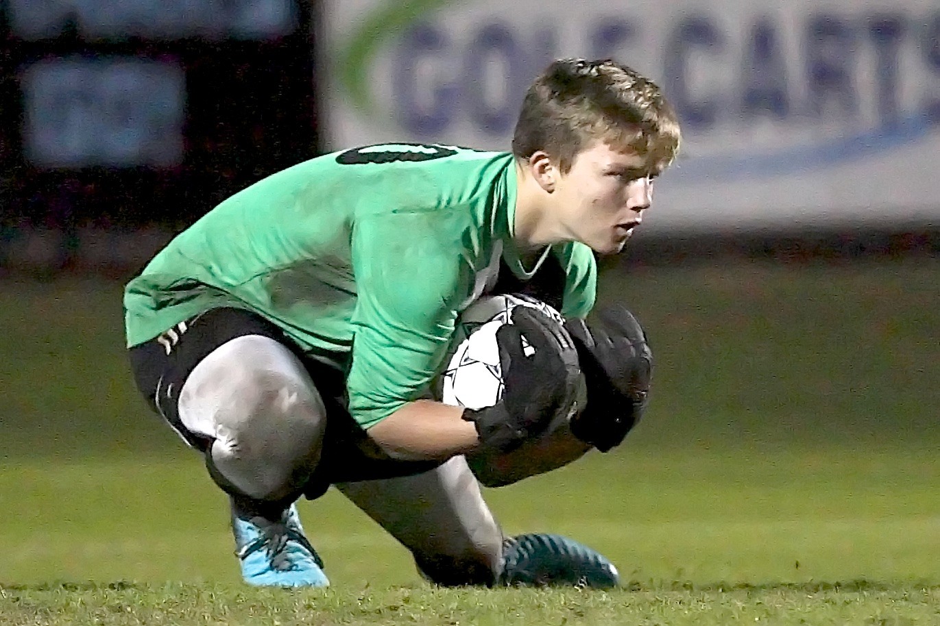Shark keeper Brian Salzman stops the ball in front of the Ponte Vedra goal.