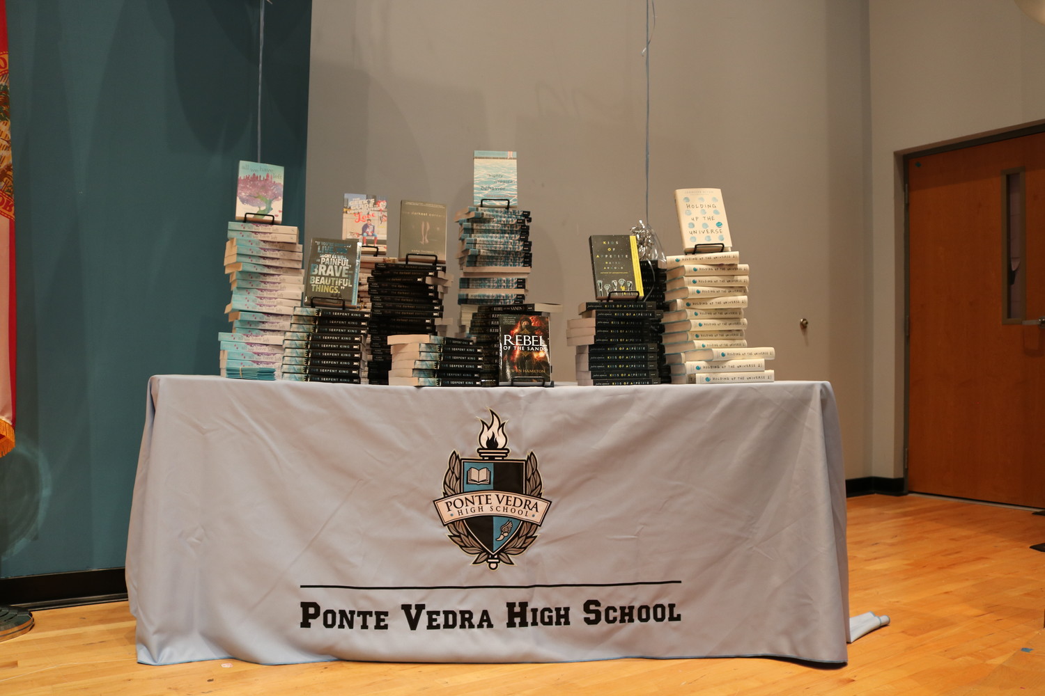A stand featuring books available for Ponte Vedra High School students at the school library.