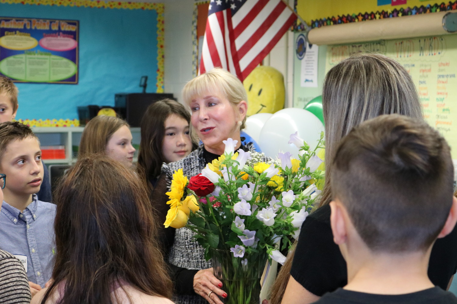 PVPV-Rawlings Elementary School students show their appreciation to First Lady Ann Scott by giving her a bouquet of flowers.