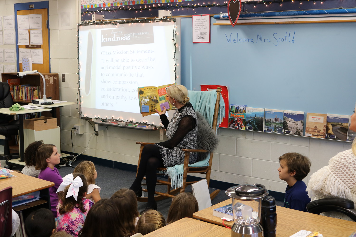 First Lady Ann Scott reads a story to PVPV-Rawlings Elementary School students as part of her literacy tour.