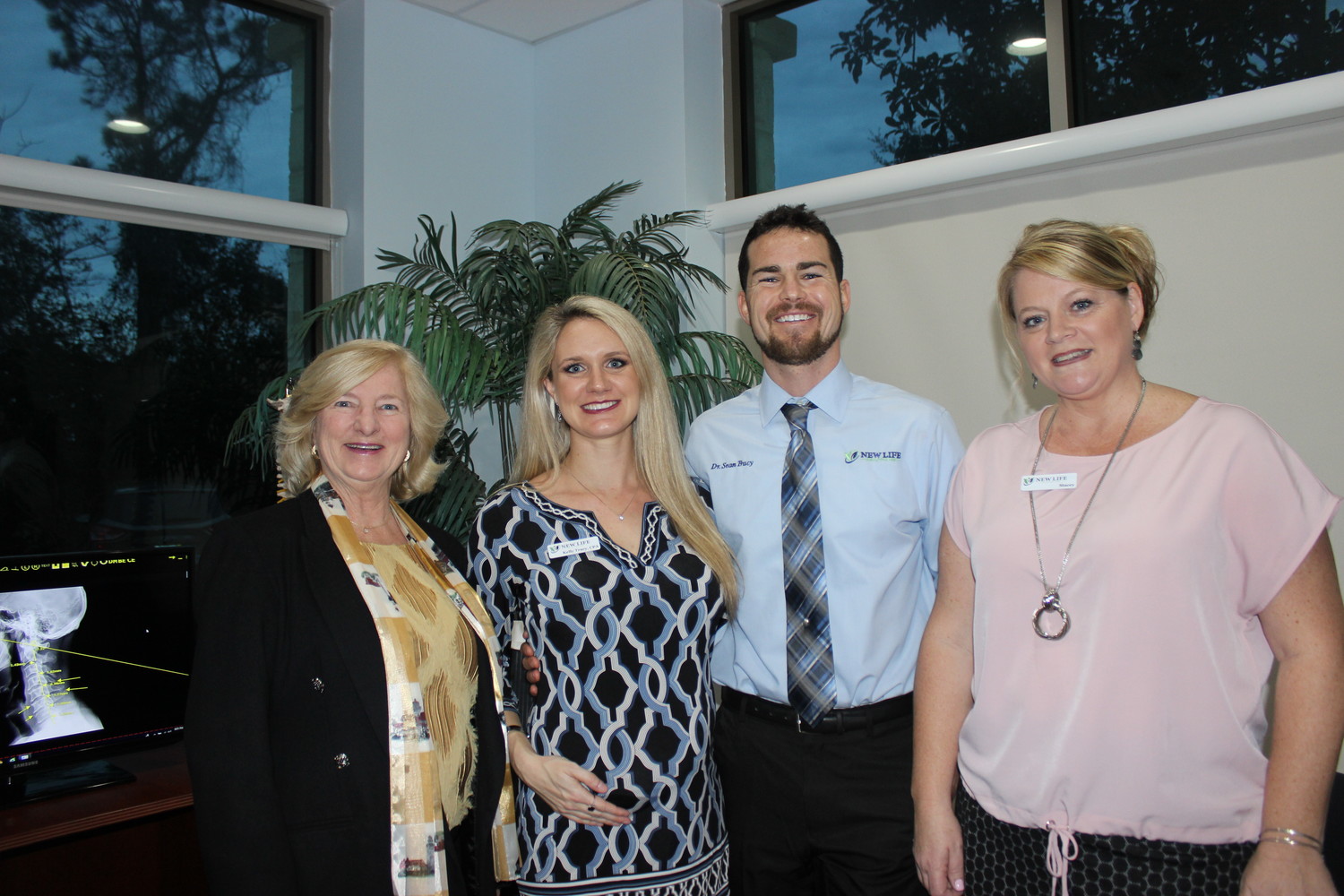 Dr. Marijane Boyd, Kelly and Dr Sean Tracy and Stacey Gabby of New Life Healthcare gather at the Jan. 24 Chamber “After Hours” event.