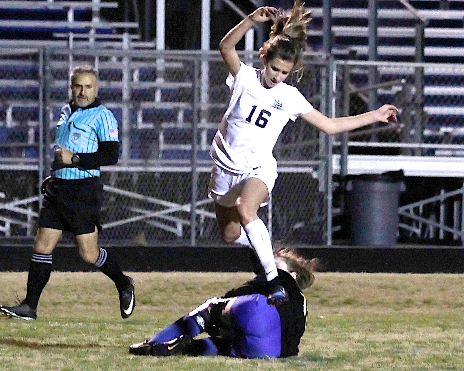 Julia Deal (16) of Ponte Vedra leaps over the Falcons’ goalkeeper.