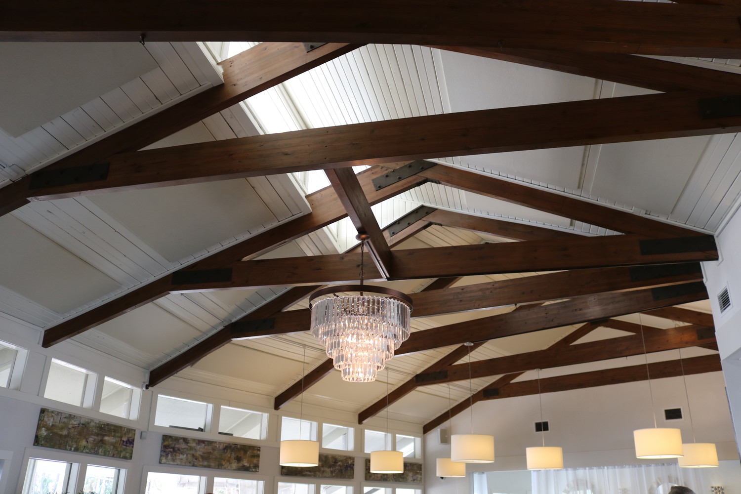 The ceiling panels implemented to reduce noise in the restaurant