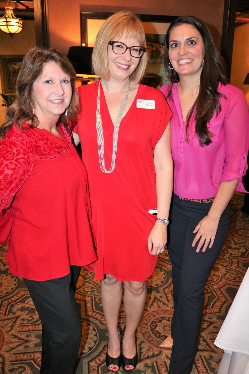 Corrina Madrid, director of foundation relations for the North Florida Chapter of the National Multiple Sclerosis Society (center), with (from left) Lynn Layton and Hilary Frank
