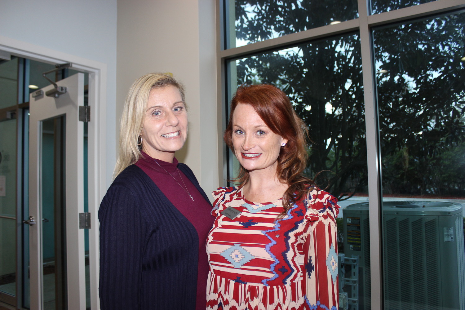 Andrea Marcus and Chelle Thomas attend the Chamber event at New Life Healthcare.