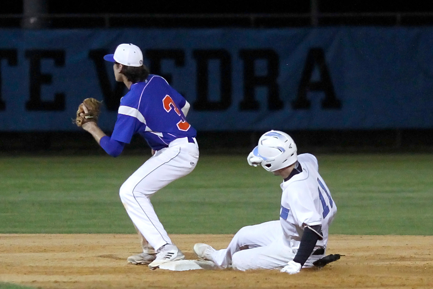 Jacob Young slides safely into second on his double.
