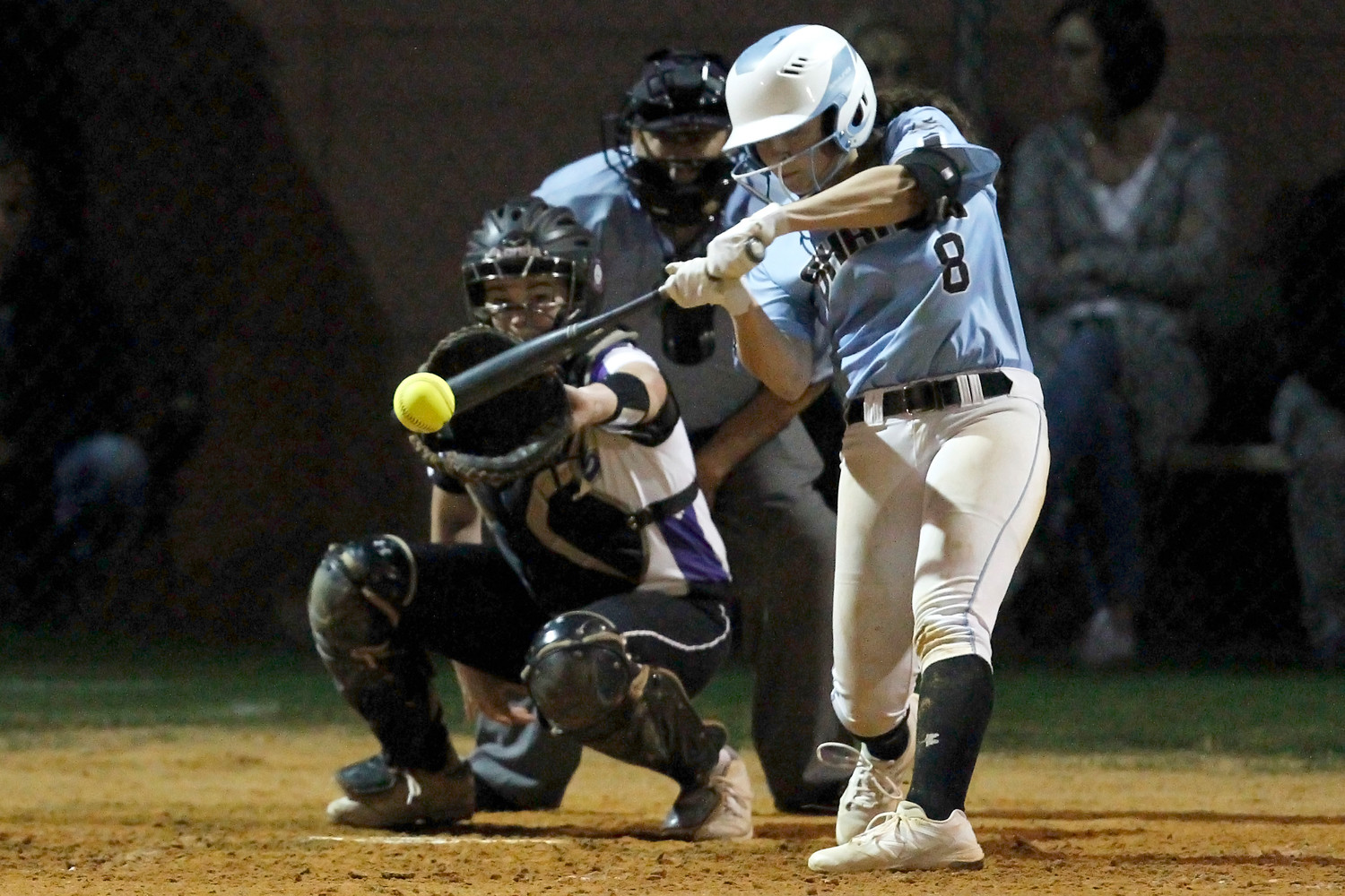 Michelle Leone smacks a solid base hit.