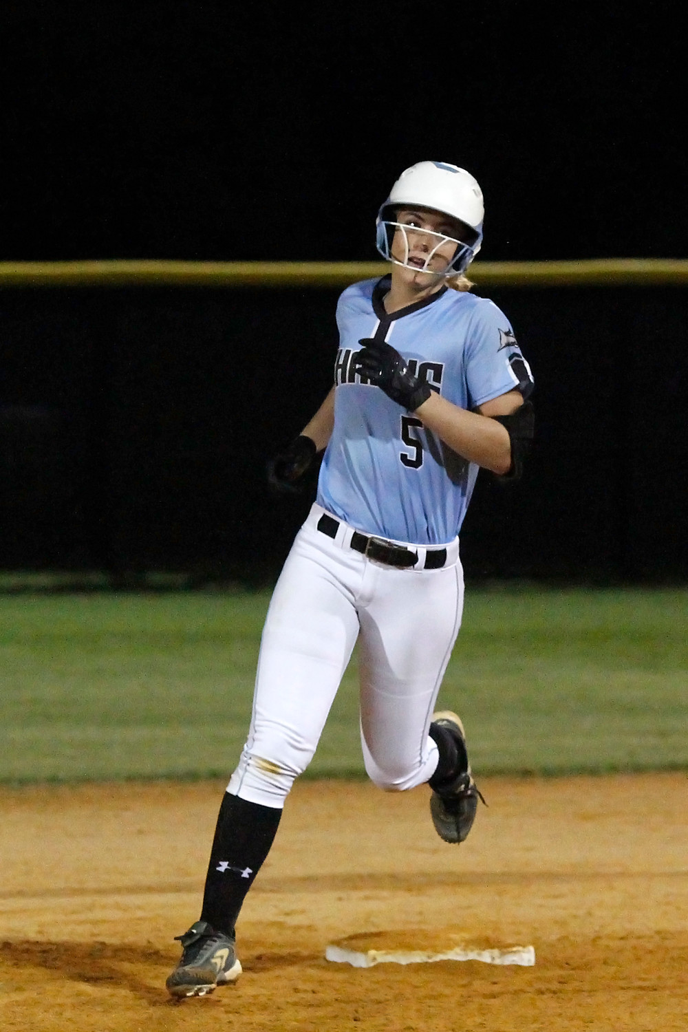 Michelle Holder rounds second in her home run trot.