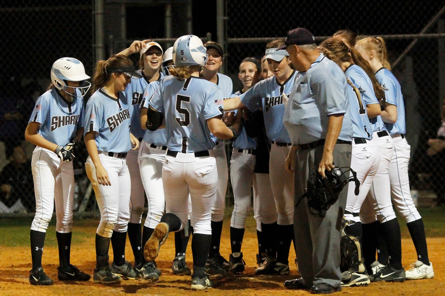 The Ponte Vedra softball team celebrates Michelle Holder’s home run in the fifth inning.