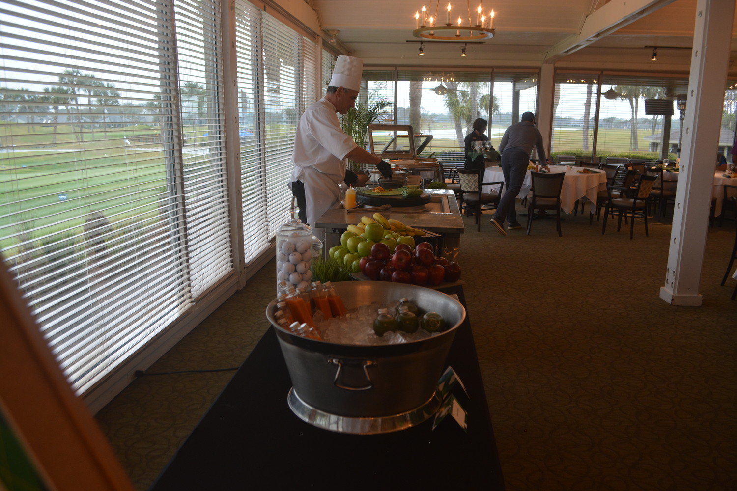 A chef prepares breakfast for Furyk & Friends Concert & Celebrity Golf Classic participants.