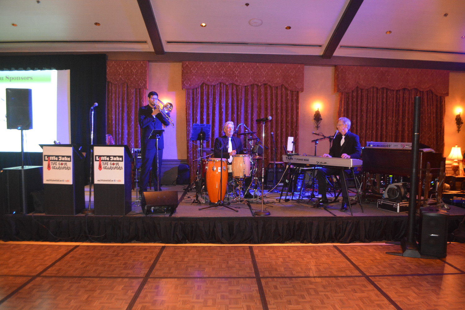 Little Jake & The Soul Searchers provide Casino Night on the Greens attendees with live music and entertainment.
