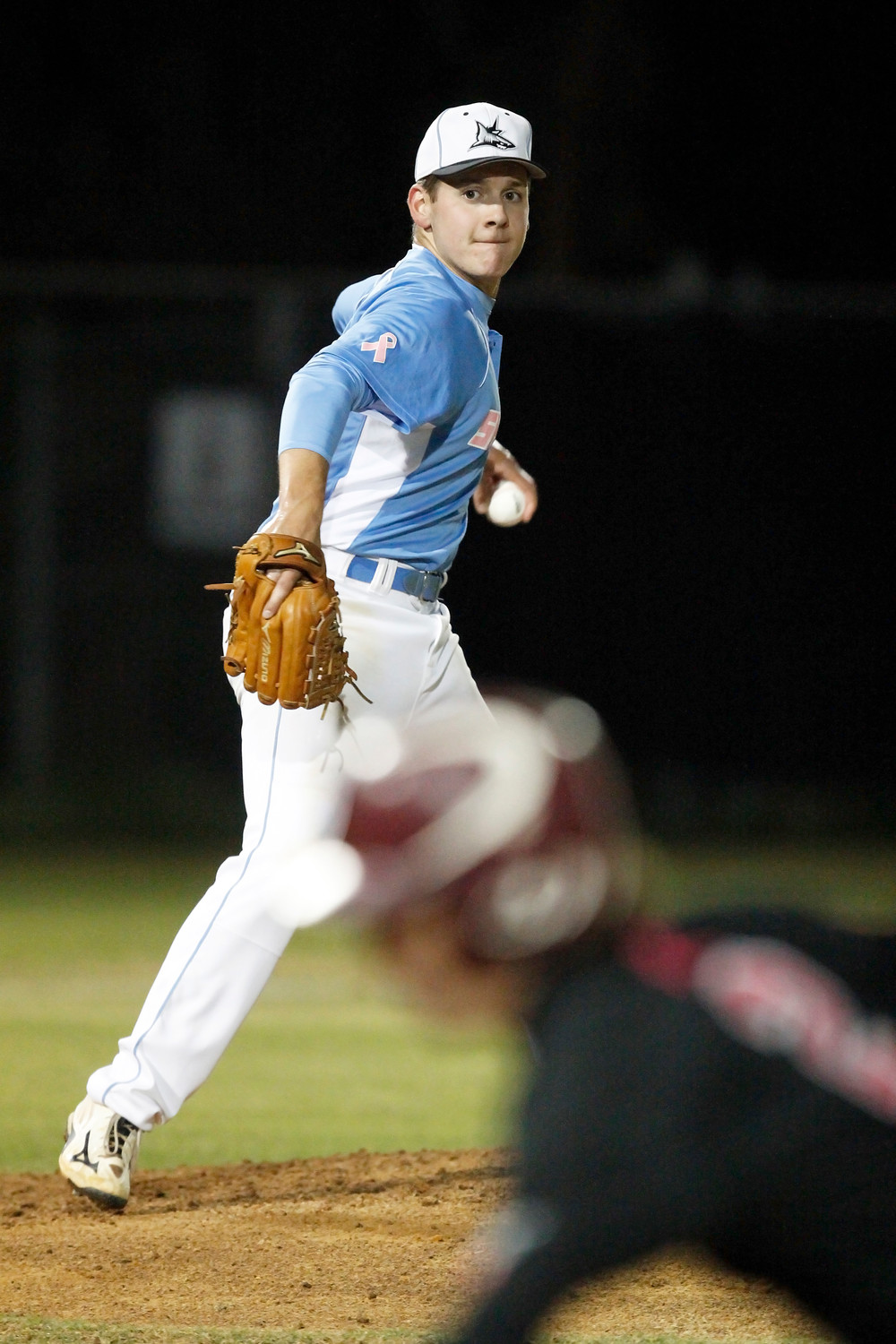 Ponte Vedra pitcher Tony Roca keeps the Episcopal base runner close as he prepares to throw.