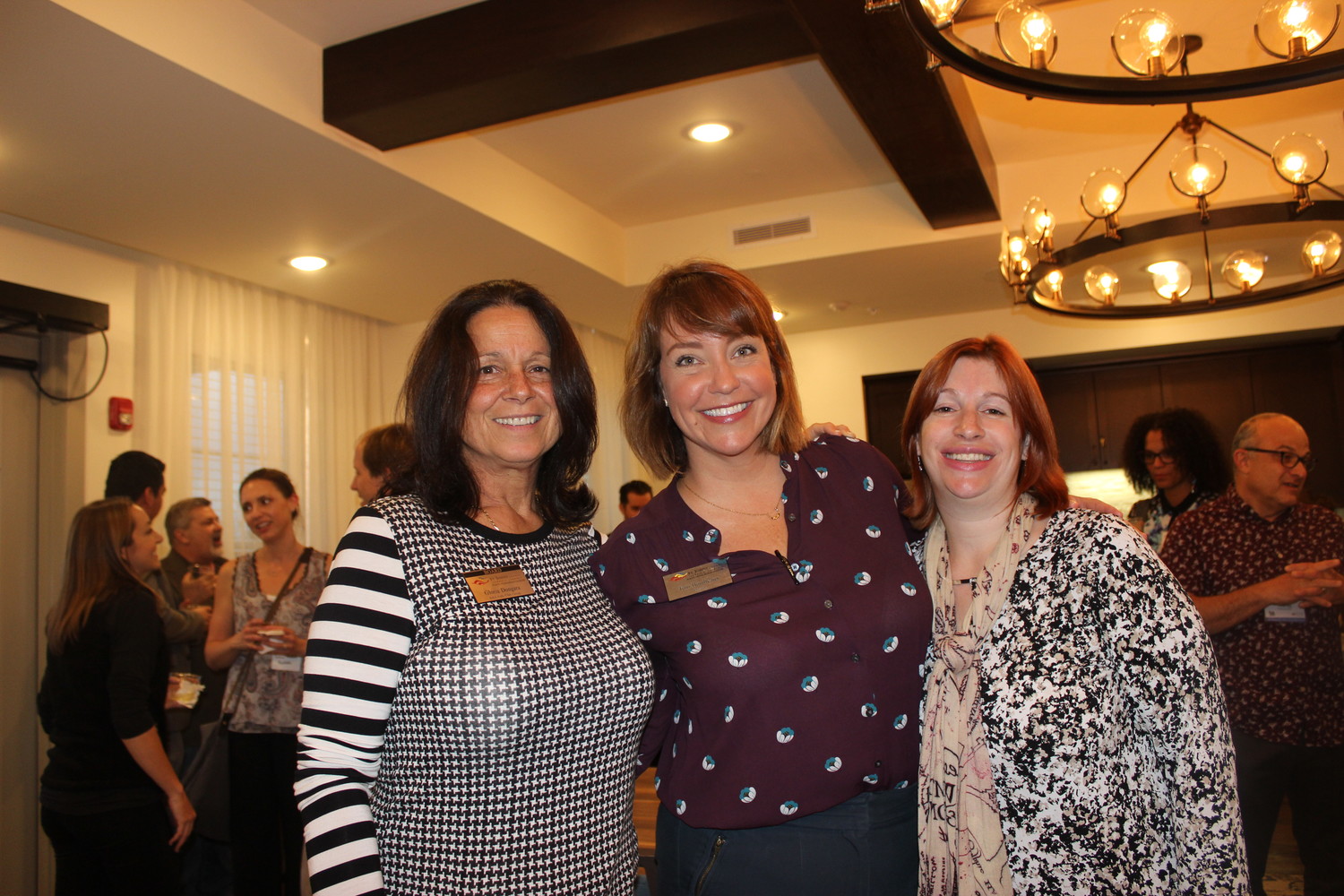 Gloria Dongara, Toni Boudreaux and Kari Zerrahn pose for a photo at the Chamber “After Hours” event held at Starling at Nocatee on Feb. 28.