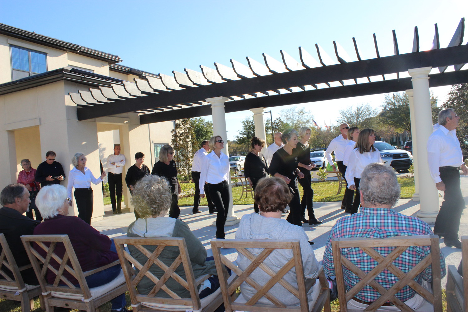 Spark, Del Webb's dance team, performs at the Starling’s grand opening event.