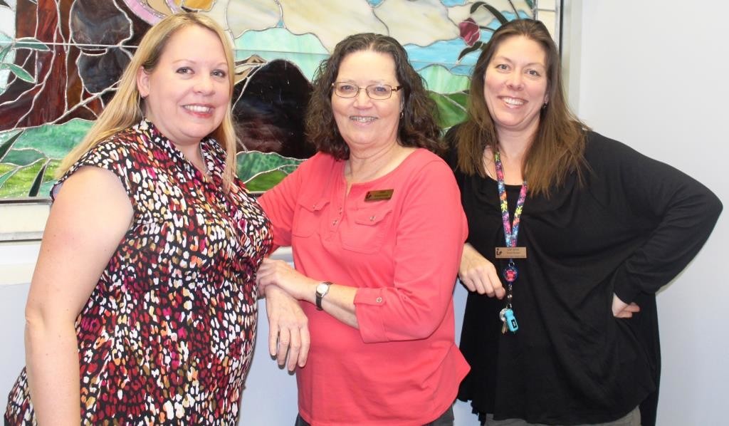 Asstistant Branch Manager and Youth Services Librarian Anne Crawford, Reference Librarian Joan Hakala, and Branch Manager Amy Ring
