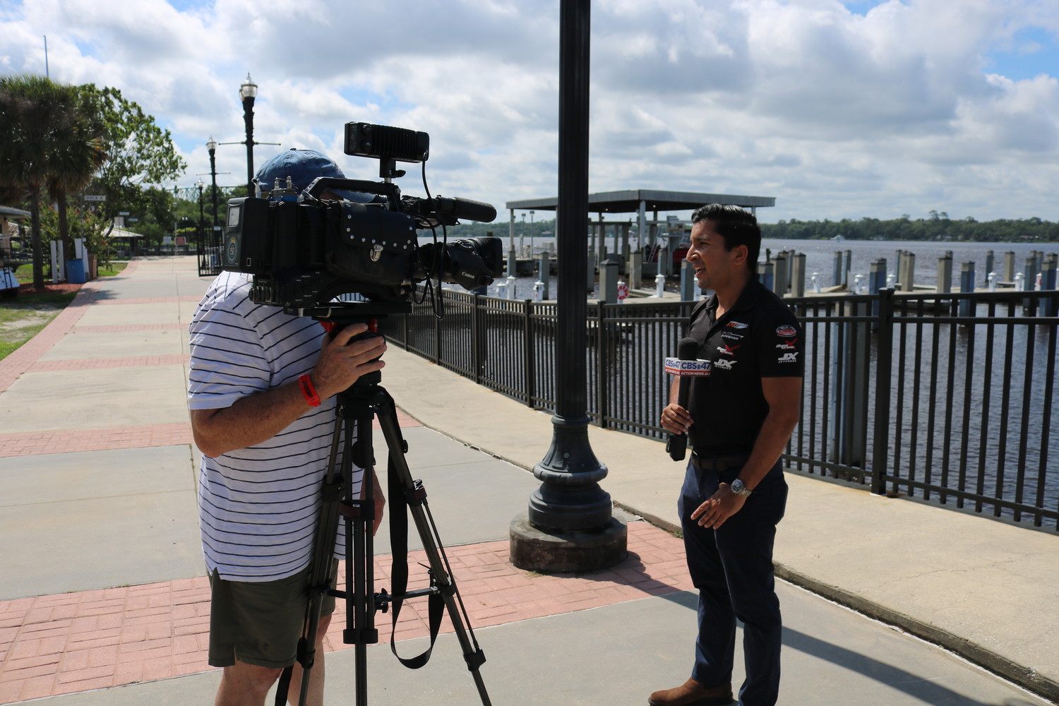 Powerboat P1 CEO Azam Rangoonwala answers questions from a local media outlet.