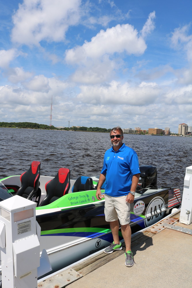 Powerboat P1 driver George Ivey prepares to take members of the media on a short boat ride to demonstrate the power of SuperStock racers.