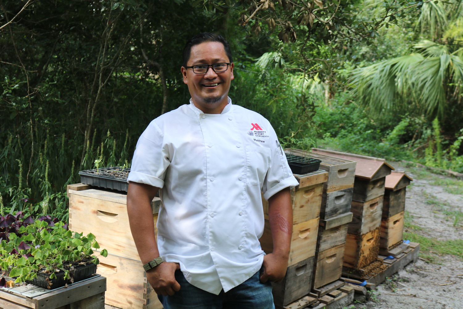 Lead Beekeeper Matt Sanchez manages 13 bee hives, a garden of crops, chickens and quail at the Sawgrass Marriott. His efforts help the culinary team source several ingredients directly from the resort’s property.