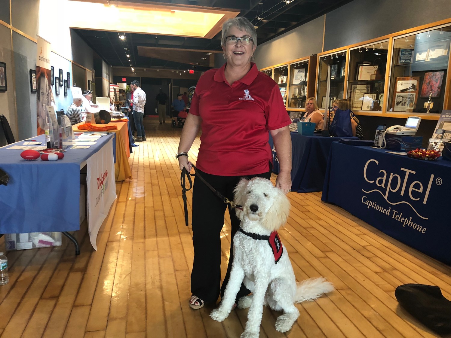 Conference guest Mary Daniel is accompanied by her faithful service animal.