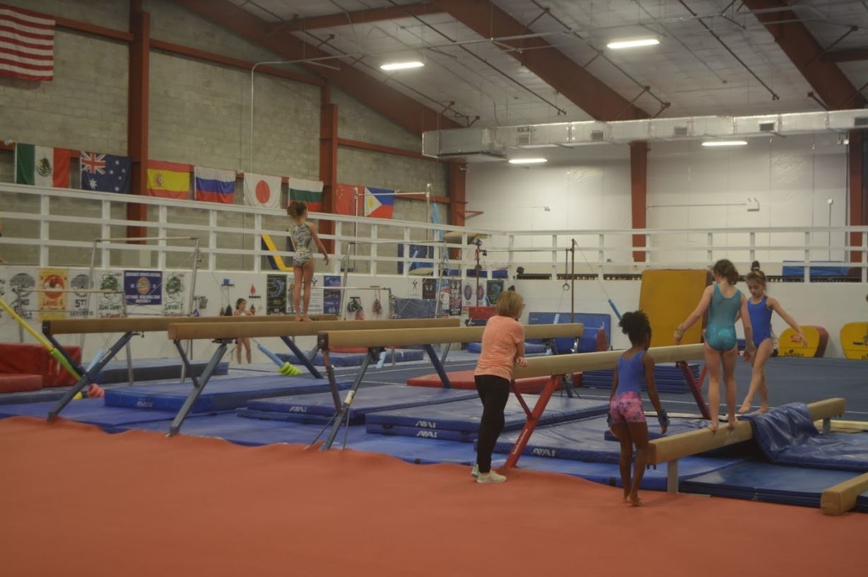 Kids enjoy the gymnastics facility at ABOVE Athletics.